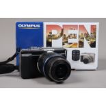 An Olympus E-PL1 Micro Four Thirds Camera, body G, digital mirrorless camera, M.Zuiko Digital 14-