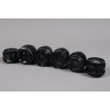 A Group of Nikon F Mount Wide Angle Lenses, a Vivitar 19mm f/3.8 Ai-S lens, a Vivitar 24mm f/2.8
