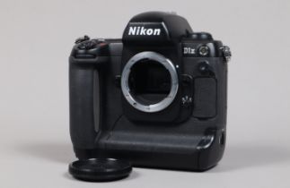 A Nikon D1x DSLR Camera Body, serial no 5108922, body G, some wear, with body cap, battery and