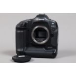 A Canon EOS-1 D DSLR Camera Body, serial no 009727, body G, some scratches to base, with body cap,