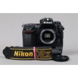 A Nikon D2x DSLR Camera Body, serial no 5047390, body G, some wear to edges, with body cap, strap,