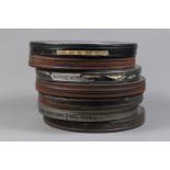 Seven Cans of 35mm Cine Films with Optical Sound, cans are 38cm diameter approx, various films wound