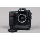 A Nikon D2x DSLR Camera Body, serial no 5028378, body G, light wear, with body cap, display screen