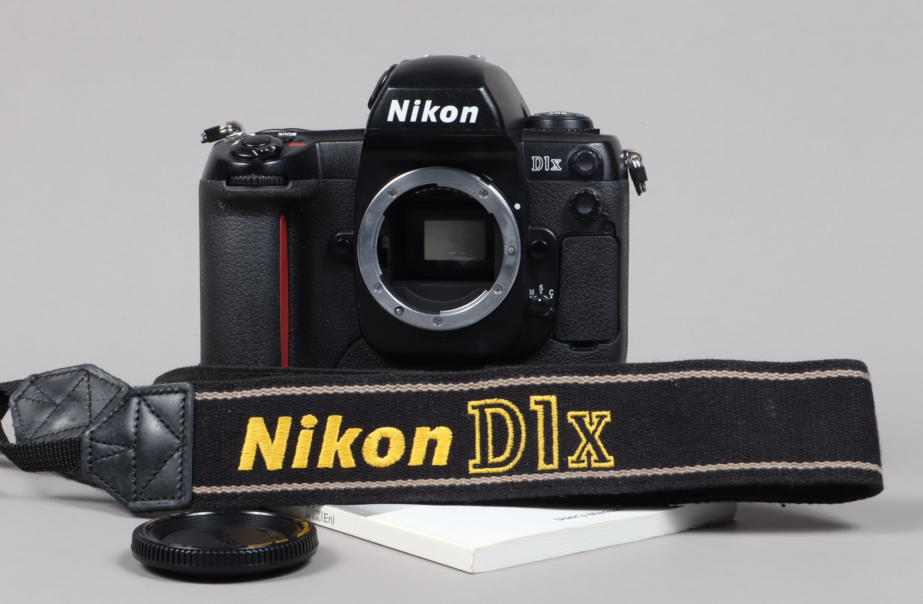 A Nikon D1x DSLR Camera Body, serial no 55140075, body G, some wear to edges, scratches to base,