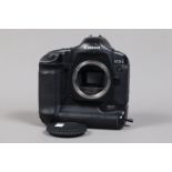 A Canon EOS-1D Mark II DSLR Camera Body, serial no 205068, body F-G, some wear to edges, with body