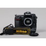 A Nikon D2x DSLR Camera Body, serial no 5010763, body G, light wear, with body cap, display screen