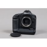 A Canon EOS-1D Mark II DSLR Camera Body, serial no 224448, body G, some wear to edges, with body