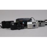 Nikon Compact Cameras, comprising a Nikon L35AF, with cap, a Nikon EF300, both cameras with soft