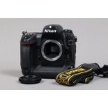 A Nikon D2H DSLR Camera body, serial no 2033866, body G, some wear, with body cap, display screen
