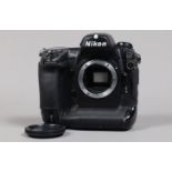 A Nikon D2Hs DSLR Camera Body, serial no 3007623, body G, some scratches to base, some wear, with