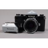 A Nikon F SLR Camera, black, serial no 4878572, shutter sticking on slow speeds, body G, with eye