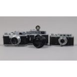 Three Zorki Cameras, a Zorki type Id, with 50mm f/3.5 lens, a Zorki 3, with 52mm f/2.8 lens and a
