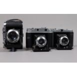 Three Franka Folding Cameras, a Solida I, shutter working, body G, elements G, a Solida II,