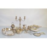 A quantity of silver plated ware, including a pair of two branch candelabra (one af), two swing