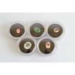 Five loose gem stones, including four beryl varieties, oval Columbian emerald 2.83ct, morganite 1.