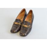 A pair of ladies Celine Paris shoes, the brown crocodile leather effect with gilt metal buckles size