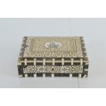 A 19th Century Indo Persian horn and ivory hinged casket, of rectangular form, the raised lid and
