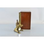A 19th Century brass Y framed microscope, in stained mahogany fitted box, 19cm high x 13xm max wide