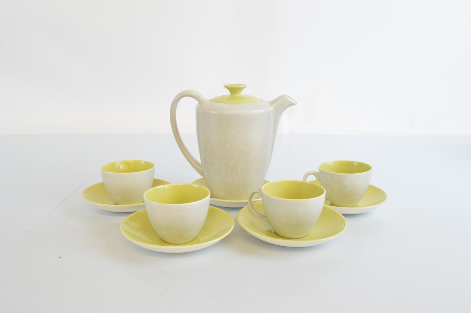 A Poole two tone four piece coffee set, in grey and lime green