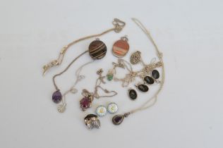 A quantity of silver jewellery, including silver and amethyst drop pendants, agate silver framed