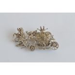 A 1950s novelty marcasite set Cinderella carriage brooch, with automatic watch, 5.9cm x 3.2cm,