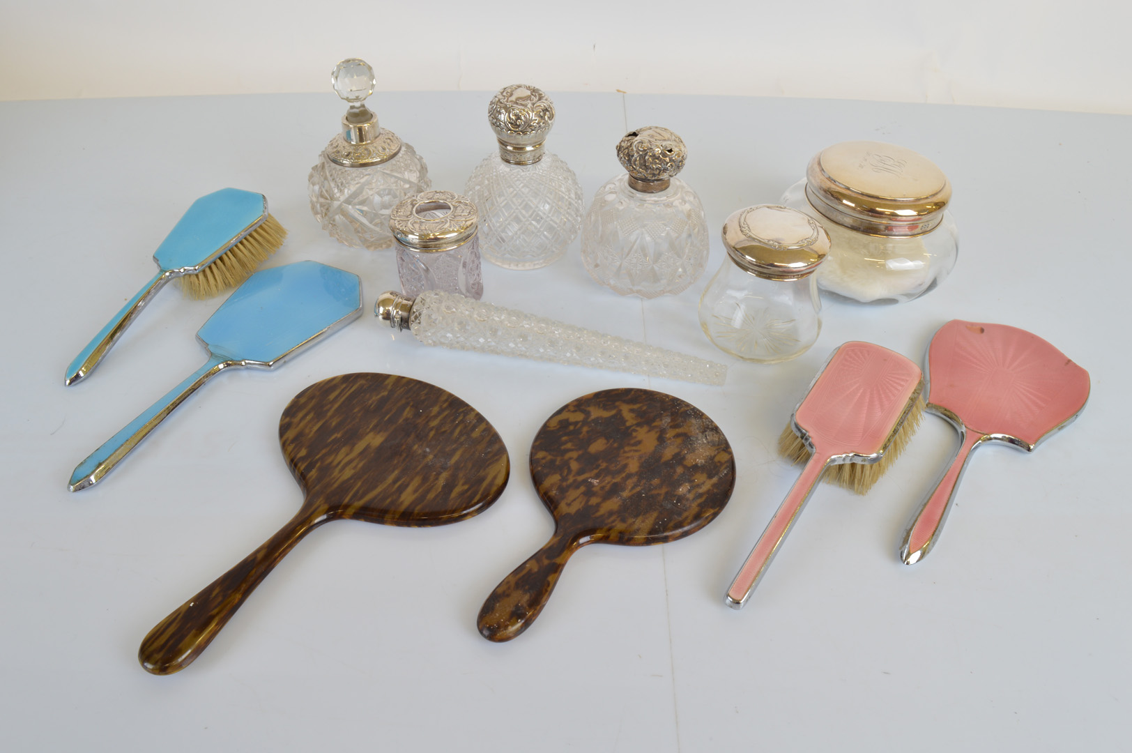 A quantity of silver and glass dressing table items, including a Victorian hobnail tapered glass