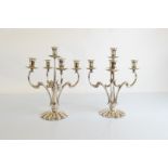 A pair of mid 20th Century Alpaca silver plated four branch candelabra, hollow cast, scroll branches