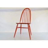 An Ercol red Harvest Range dining chair, dated 1960