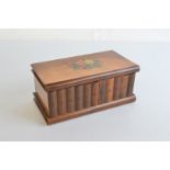 An early 20th Century Sorrento ware olive wood puzzle box, with transfer printed floral spray, roman