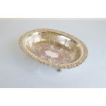 A Garrard & Co silver plated oval footed bowl, with ornate chased rim and engraved decoration,