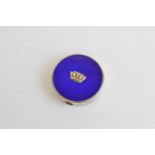 A George V silver and enamel naval compact, with blue guilloche enamel centred with naval crown,