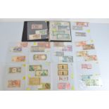 A good collection of African, Middle East, Israeli, and Far East bank notes, including Indian