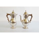 A George VI café au lait set, in the George III style, baluster bodies, scroll spout, spreading
