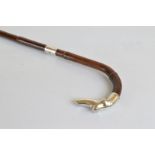 A George V bamboo and silver walking cane, with silver naturalistic handle and collar, copper and