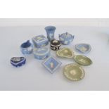 A collection of Wedgwood Jasperware, including a quantity of blue and white bowls and covers,