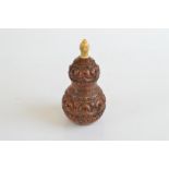 A concilla nut and bone scent bottle, of double gourd form with screw off cap, 9cm high