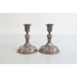 A pair of Norwegian silver filled dwarf candlesticks, of circular lobed shape with waisted stem