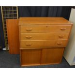 A single teak Ladderax unit, comprising two teak cabinets, one fitted with three long drawers, the