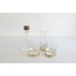 A contemporary Carrs silver and glass whisky set, comprising a pair of tumblers with silver bases, a