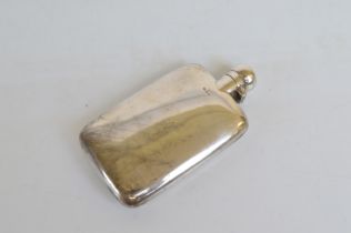 A George V silver rectangular hip flask, with hinged screw off cap, cork inner, dated Birmingham