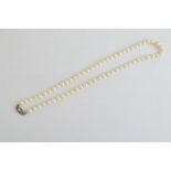 A string of graduated cultured pearls, knotted strung on a silver and marcasite clasp
