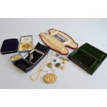 A quantity of costume jewellery, including a 19th Century Chinese carved ivory panel in silver