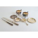 A small collection of Norwegian silver, including a tea strainer, three silver dishes, and a
