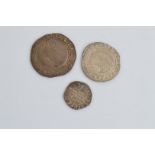 An Elizabeth I hammered shilling, with no date together with an Elizabeth I six pence and a Tudor