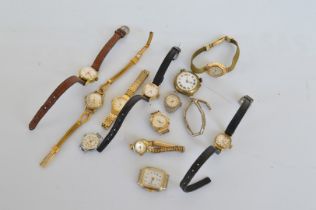 A quantity of ladies watches, including an early 20th Century trench watch and various other