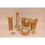 A art deco style copper candlestick, 26.5cm high, together with assorted brass pieces including,