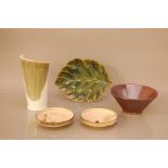 A collection of 20th century oriental ceramics, comprising a vase 21cm high, a leave shaped platter,