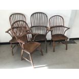 A group of antique and vintage Windsor style chairs, some with wear and repairs (4)