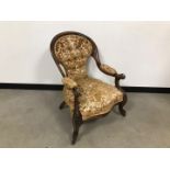 A Victorian walnut framed and upholstered armchair, AF, repaired