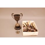 A collection of silver plated cutlery, together with a silver plated trophy, 18cm high and an